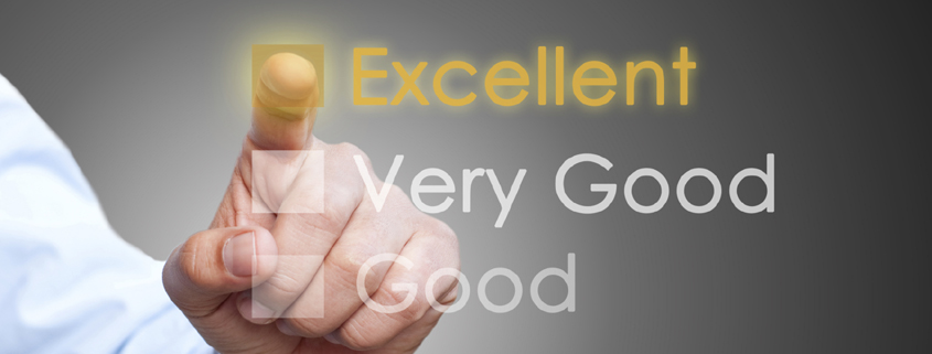 Concept image shows the hand of a man wearing a white dress shirt pressing a button labeled "Excellent" that is placed above buttons labeled "Very Good" and "Good"