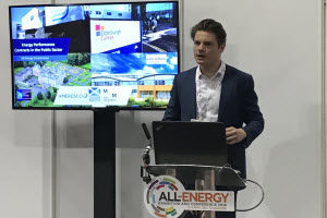 Austen Bamford of Ameresco presents at a conference in Scotland.