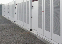 Daytime view of battery energy storage enclosures in Newmarket Ontario