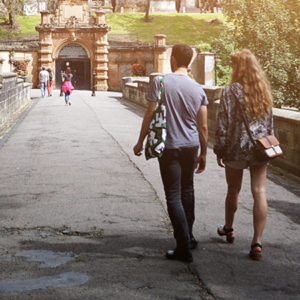 Daytime view of students walking on a college campus in Scotland